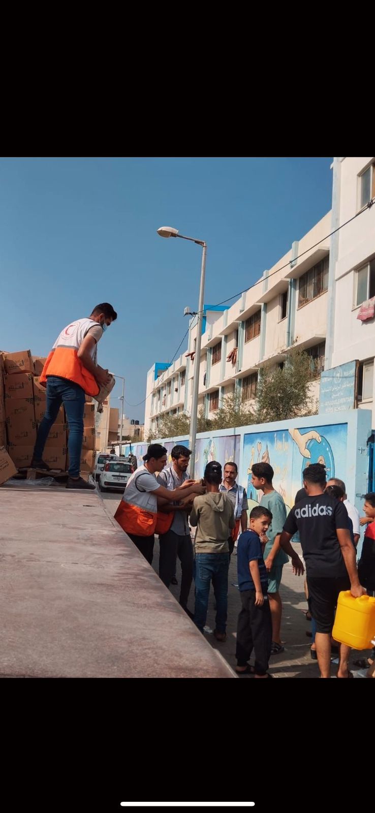 توزيع سلع التحالف الوطنى للعمل الأهلى الغذائية على أهالينا فى غزة 4